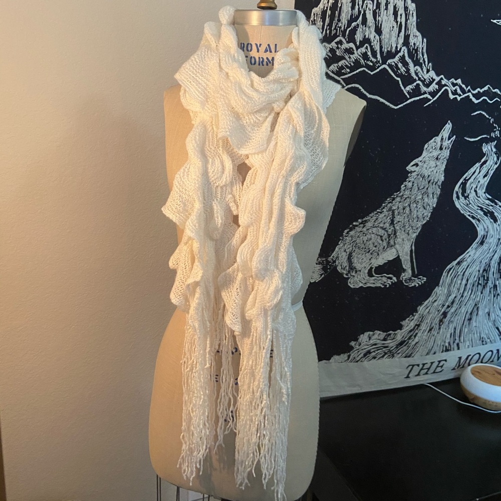 Cream stretchy ruffle scarf with fringe